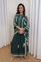 Inessa Cape and Pants Set women's emerald green double georgette co-ord featuring a geometric printed cape blouse with a fluid, flowing silhouette and matching relaxed-fit pants, styled for resort holidays, summer brunches, destination celebrations and sophisticated day-to-evening occasions.