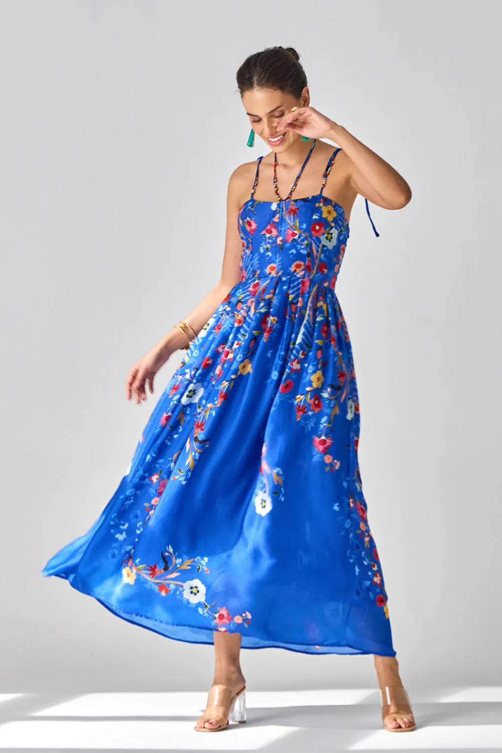 Isla Spaghetti Dress women's blue satin chiffon maxi dress featuring delicate spaghetti straps, a sleek flowing silhouette and minimal elegant styling, designed for resort evenings, intimate dinners, summer holidays and destination celebrations.