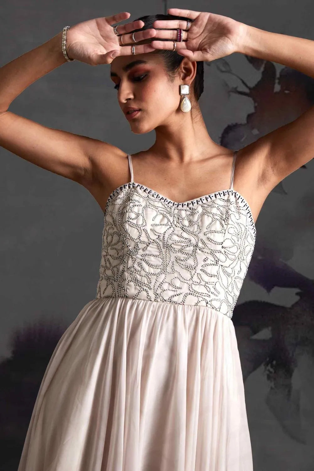 Cloesup look of Ivina Corset Dress women's ivory organza maxi dress featuring a structured corset bodice, delicate sequin embellishments over a floral print and a flowing floor-length silhouette, styled for resort celebrations, summer weddings, formal gatherings and special occasions.