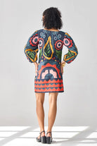 Back view of Jane Embroidered Dress women's navy cotton poplin shift dress featuring intricate embroidery, a relaxed straight silhouette and a versatile mini-length design, styled for summer brunches, daytime celebrations, resort outings and elegant day-to-evening occasions.
