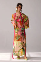 Jianna Dress women's pink ombre double georgette maxi dress featuring a vibrant mixed print, dramatic flared sleeves and a flowing floor-length silhouette, styled for resort vacations, summer celebrations, destination dinners and elegant daytime occasions.