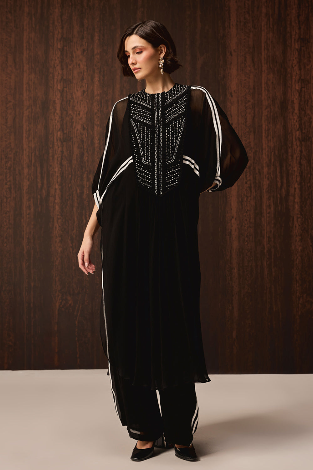 Jivi Embroidered Kaftan With Pants women's black viscose chiffon co-ord set featuring a flowing one-size kaftan with intricate monochromatic embroidery and matching pants, styled for upscale lunches, resort holidays, evening gatherings and sophisticated occasion wear.