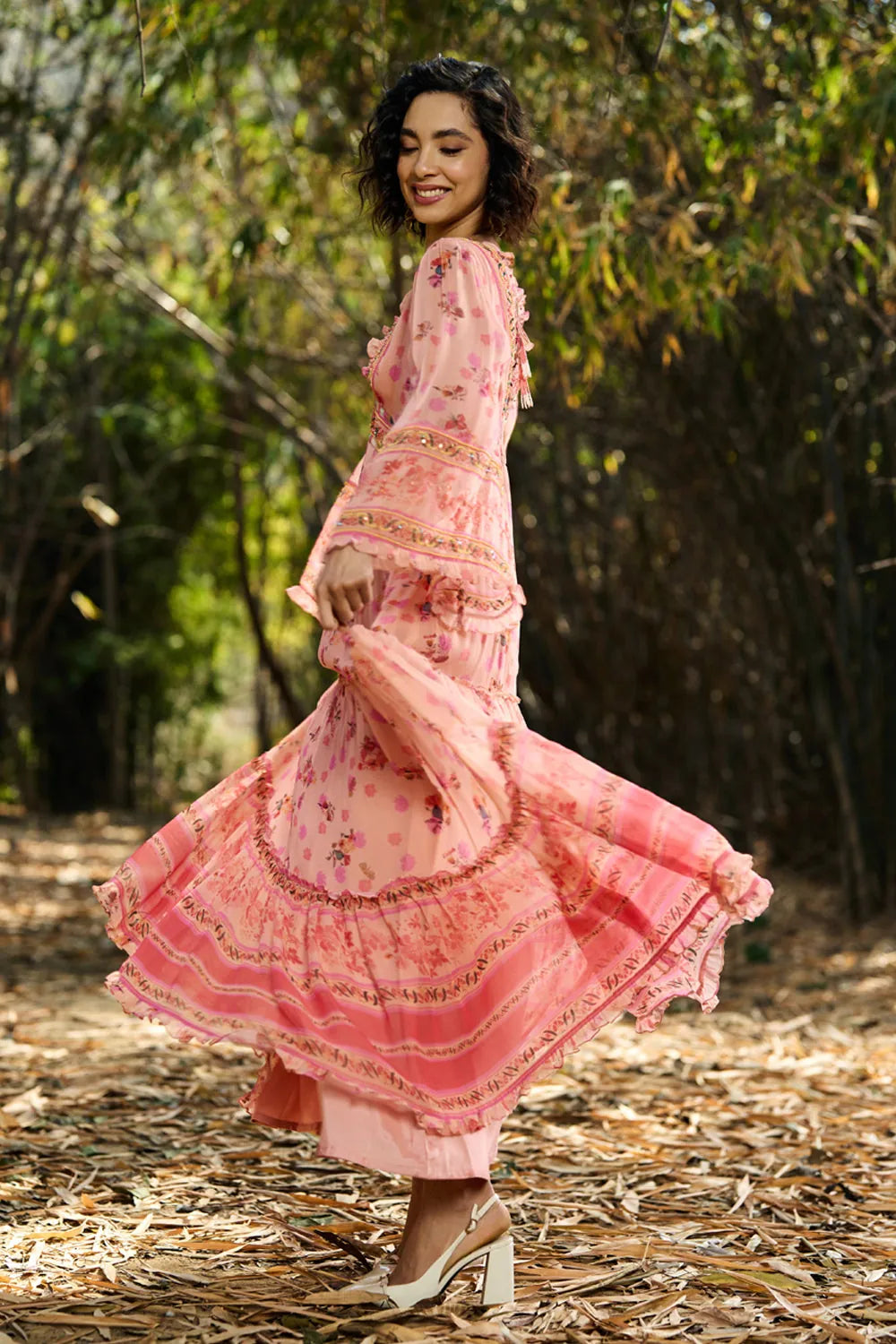 Joly Embroidered Maxi Dress women's peach and pink viscose georgette maxi dress featuring a playful printed design, V-neckline, beaded embroidered neckline and adjustable smocked waist, styled for weddings, summer holidays, resort dinners and special occasions.