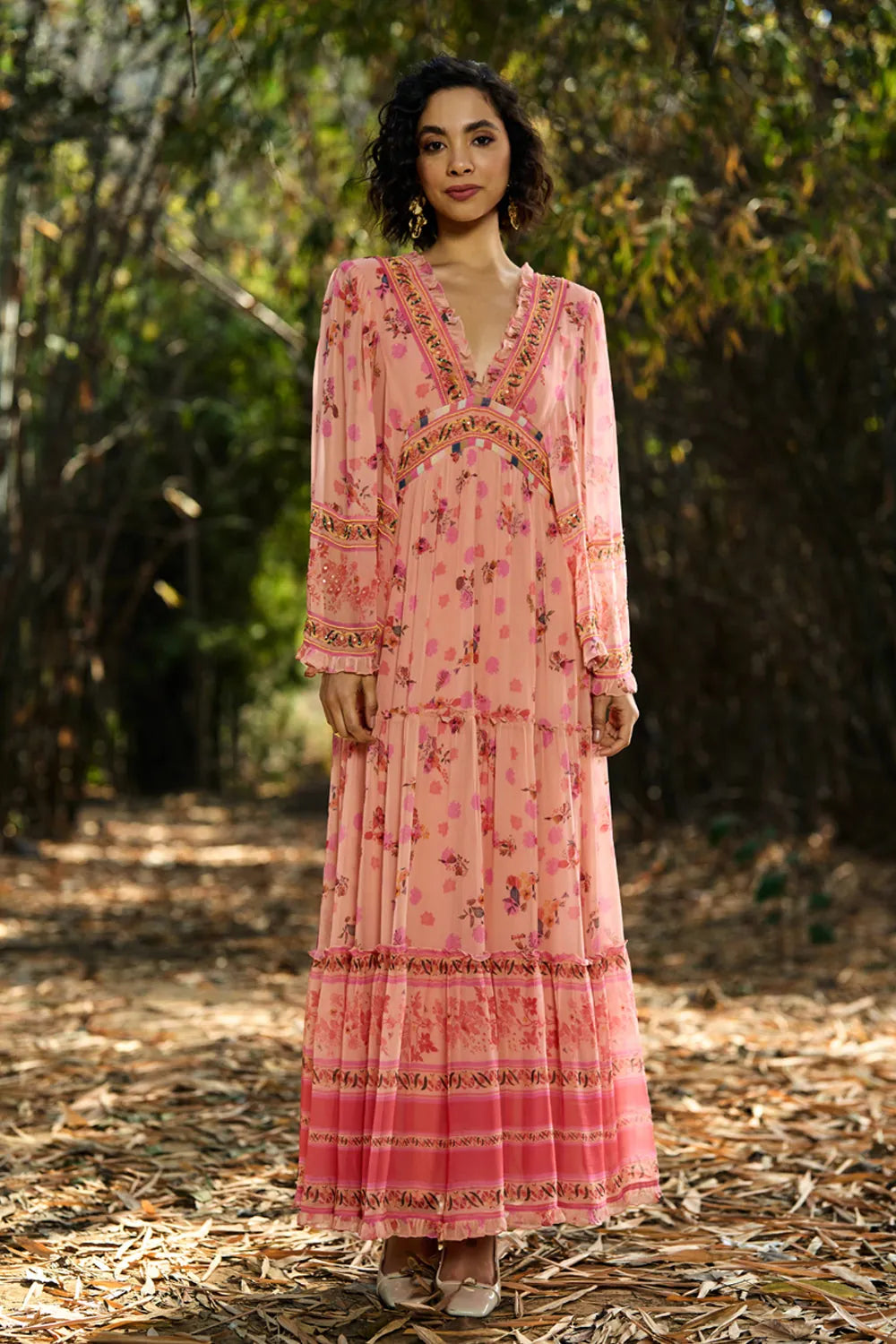 Joly Embroidered Maxi Dress women's peach and pink viscose georgette maxi dress featuring a playful printed design, V-neckline, beaded embroidered neckline and adjustable smocked waist, styled for weddings, summer holidays, resort dinners and special occasions.