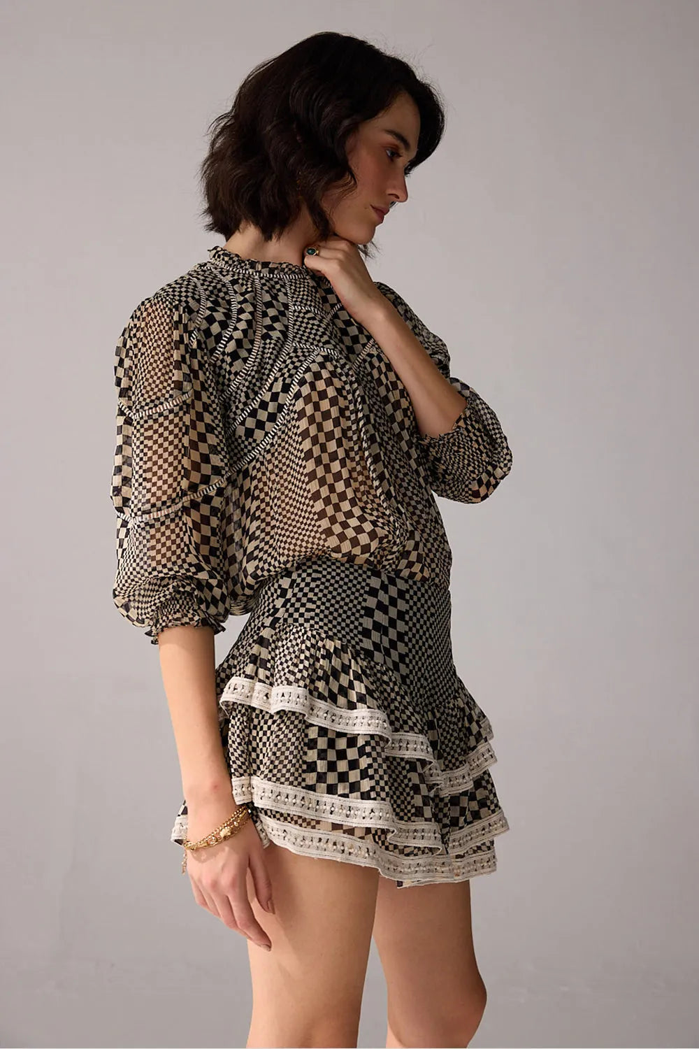 Side view of Keira Blouse women's statement blouse featuring a contemporary silhouette and distinctive design details, styled for summer brunches, resort outings, casual celebrations and elevated everyday wear.