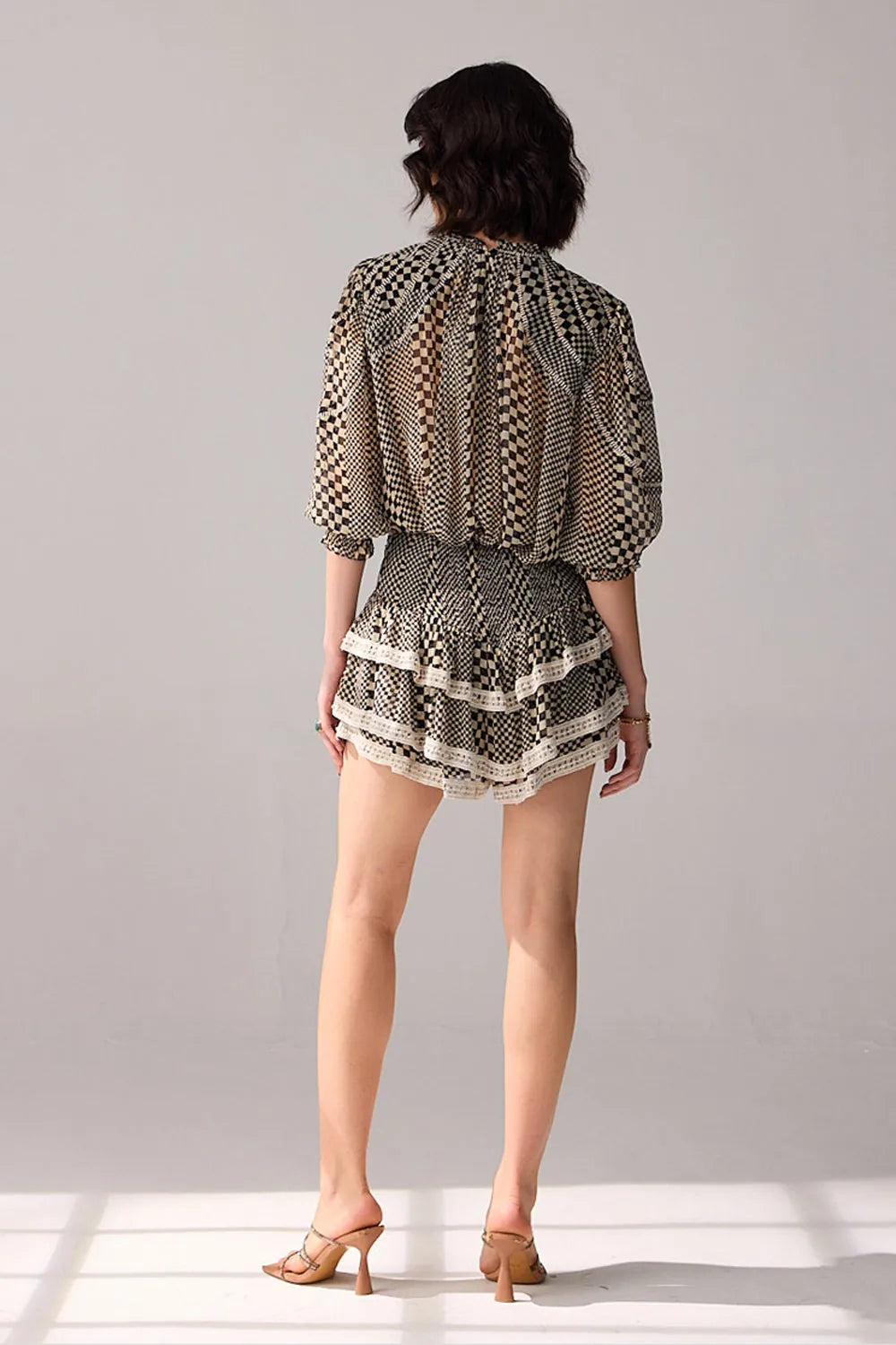 Back view of Keira Skorts women's skorts featuring a contemporary tailored silhouette that combines the appearance of a skirt with the practicality of shorts, styled for summer holidays, resort outings, brunches and casual daytime wear.