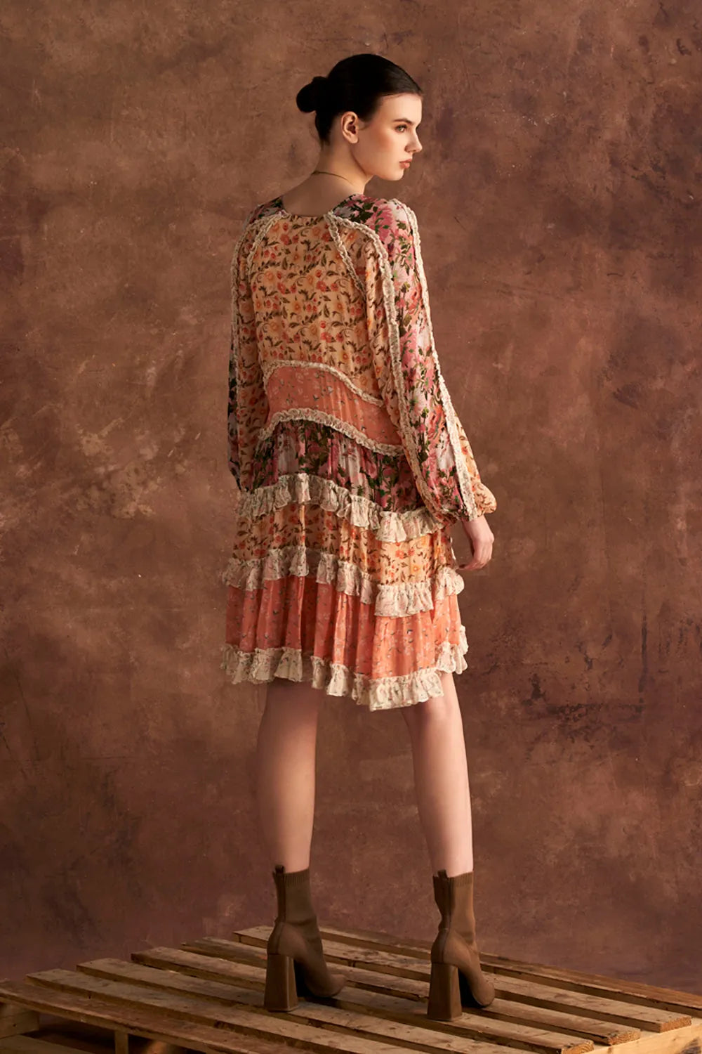 Back view of Kira Dress women's multicolour Viscose Georgette mini dress featuring an eye-catching mixed print and a fluid, contemporary silhouette, styled for summer brunches, resort vacations, holiday outings and day-to-evening occasions.