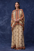 Lana Embroidered Cape With Pants women's co-ord set featuring a flowing embroidered cape paired with matching pants, combining intricate detailing with an elegant relaxed silhouette, styled for festive gatherings, resort dinners, destination celebrations and special occasions.