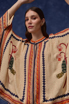 Closeup look of Lana Embroidered Cape With Pants women's co-ord set featuring a flowing embroidered cape paired with matching pants, combining intricate detailing with an elegant relaxed silhouette, styled for festive gatherings, resort dinners, destination celebrations and special occasions.