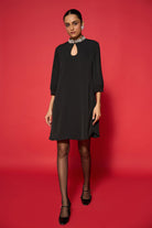 Lexi Embroidered Dress women's embroidered dress featuring intricate decorative detailing and a statement silhouette, styled for festive gatherings, evening celebrations, resort dinners and special occasions.