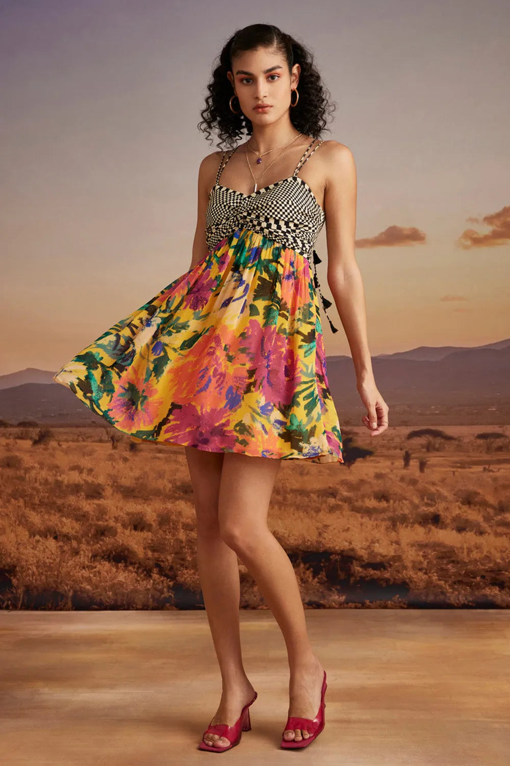 Lilly Mini Dress in Sunny Mustard women's mustard yellow viscose georgette mini dress featuring a vibrant floral print and a playful, lightweight silhouette, styled for summer brunches, vacation outings, garden parties and resort holidays.