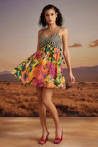 Lilly Mini Dress in Sunny Mustard women's mustard yellow viscose georgette mini dress featuring a vibrant floral print and a playful, lightweight silhouette, styled for summer brunches, vacation outings, garden parties and resort holidays.