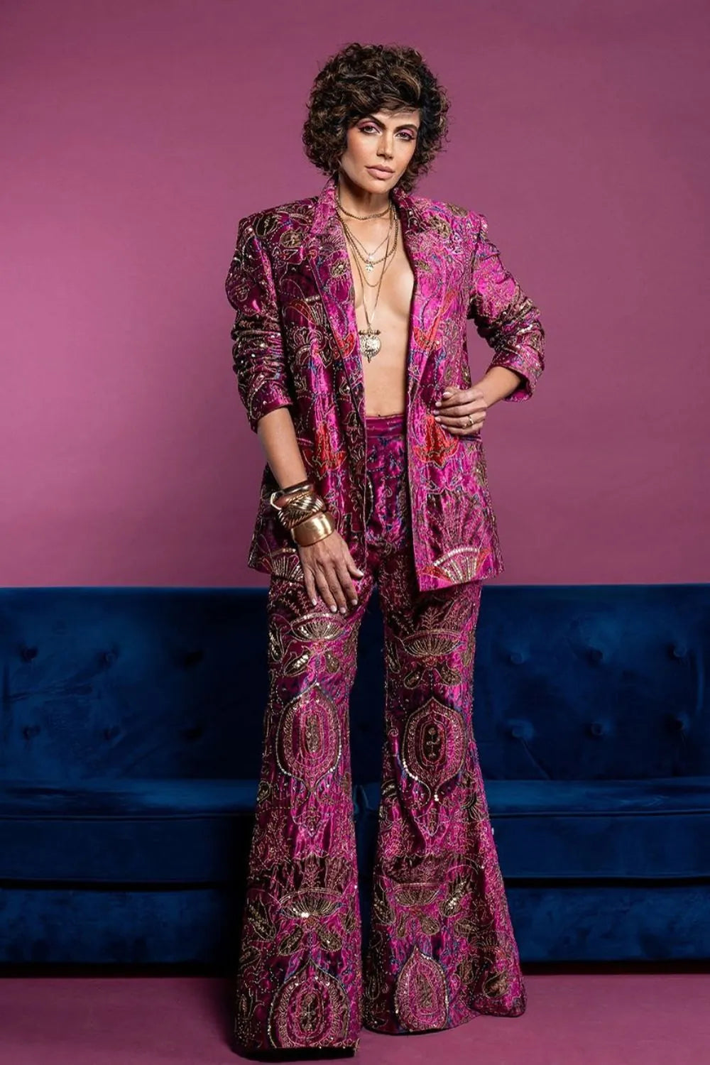 Mandira Bedi wearing the Ramona Jacket & Pants Set, a women's ruby pink velvet co-ord featuring a structured jacket and matching tailored pants with intricate thread and sequin detailing, styled for cocktail parties, festive celebrations, evening events and glamorous occasions.