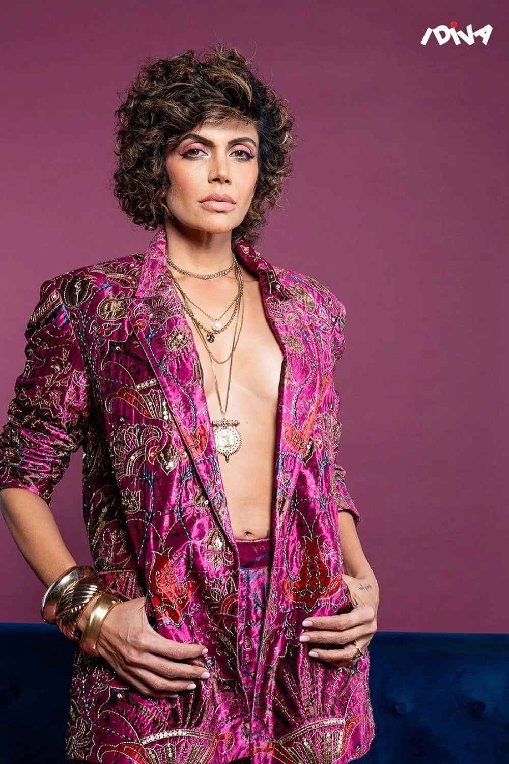 Mandira Bedi wearing the Ramona Jacket & Pants Set, a women's ruby pink velvet co-ord featuring a structured jacket and matching tailored pants with intricate thread and sequin detailing, styled for cocktail parties, festive celebrations, evening events and glamorous occasions.