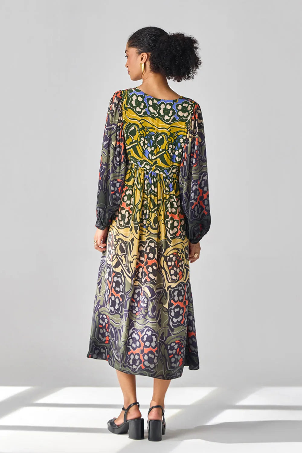 Back view of Mau Dress women's ombre viscose crepe dress featuring gradient hues and intricate thread and sequin detailing along the yoke, creating an elegant silhouette with subtle sparkle, styled for summer celebrations, resort evenings, dinner parties and day-to-evening occasions.
