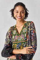 Closeup look of Mau Dress women's ombre viscose crepe dress featuring gradient hues and intricate thread and sequin detailing along the yoke, creating an elegant silhouette with subtle sparkle, styled for summer celebrations, resort evenings, dinner parties and day-to-evening occasions.