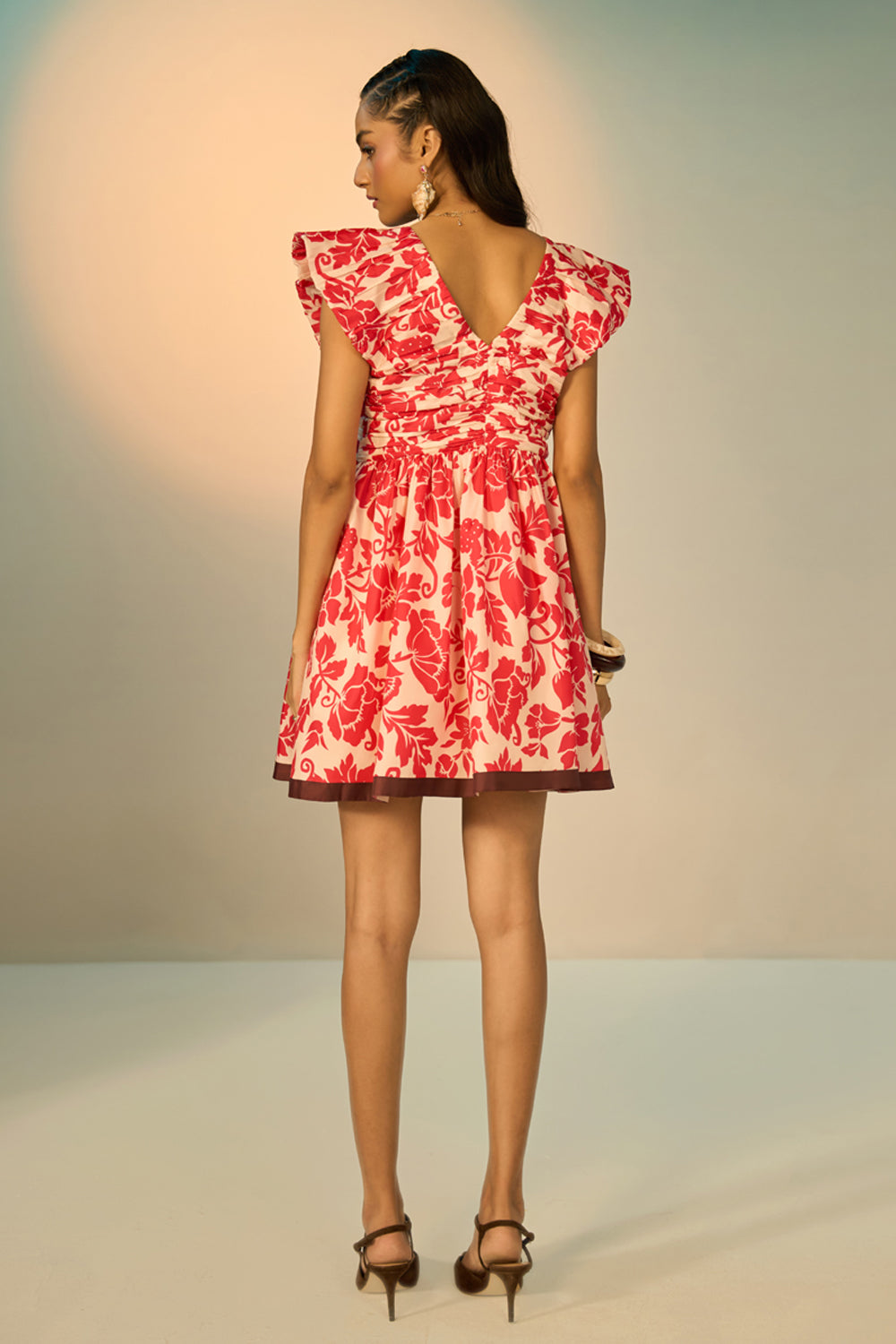 Back view of Myra Mini Dress women's mini dress featuring a feminine silhouette and contemporary design details, styled for summer brunches, resort holidays, daytime gatherings and casual celebrations.