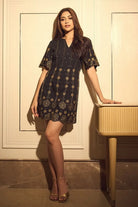 Nandini Gupta wearing the Aira Mini Dress, a women's mini dress featuring a vibrant printed design, a flattering fitted silhouette and contemporary detailing, styled for summer brunches, resort vacations, holiday outings and daytime celebrations.