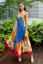 Nandini Gupta wearing the Ayla Dress, a women's multicolour satin maxi dress featuring an engineered floral print, plunging neckline, embroidered beaded neckline and adjustable smocked back, styled for resort vacations, summer holidays and casual day outings.