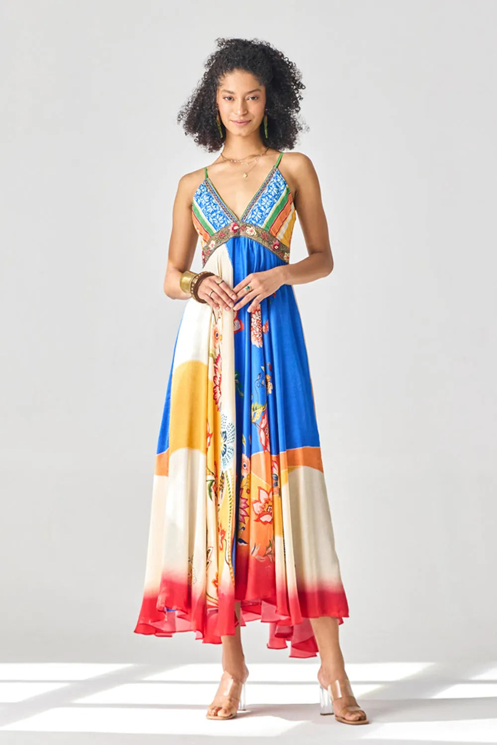 Nandini Gupta wearing the Ayla Dress, a women's multicolour satin maxi dress featuring an engineered floral print, plunging neckline, embroidered beaded neckline and adjustable smocked back, styled for resort vacations, summer holidays and casual day outings.