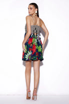 Back view of Noemi Mini Dress women's mini dress featuring a chic contemporary silhouette and distinctive design details, styled for summer brunches, resort vacations, holiday outings and casual celebrations.