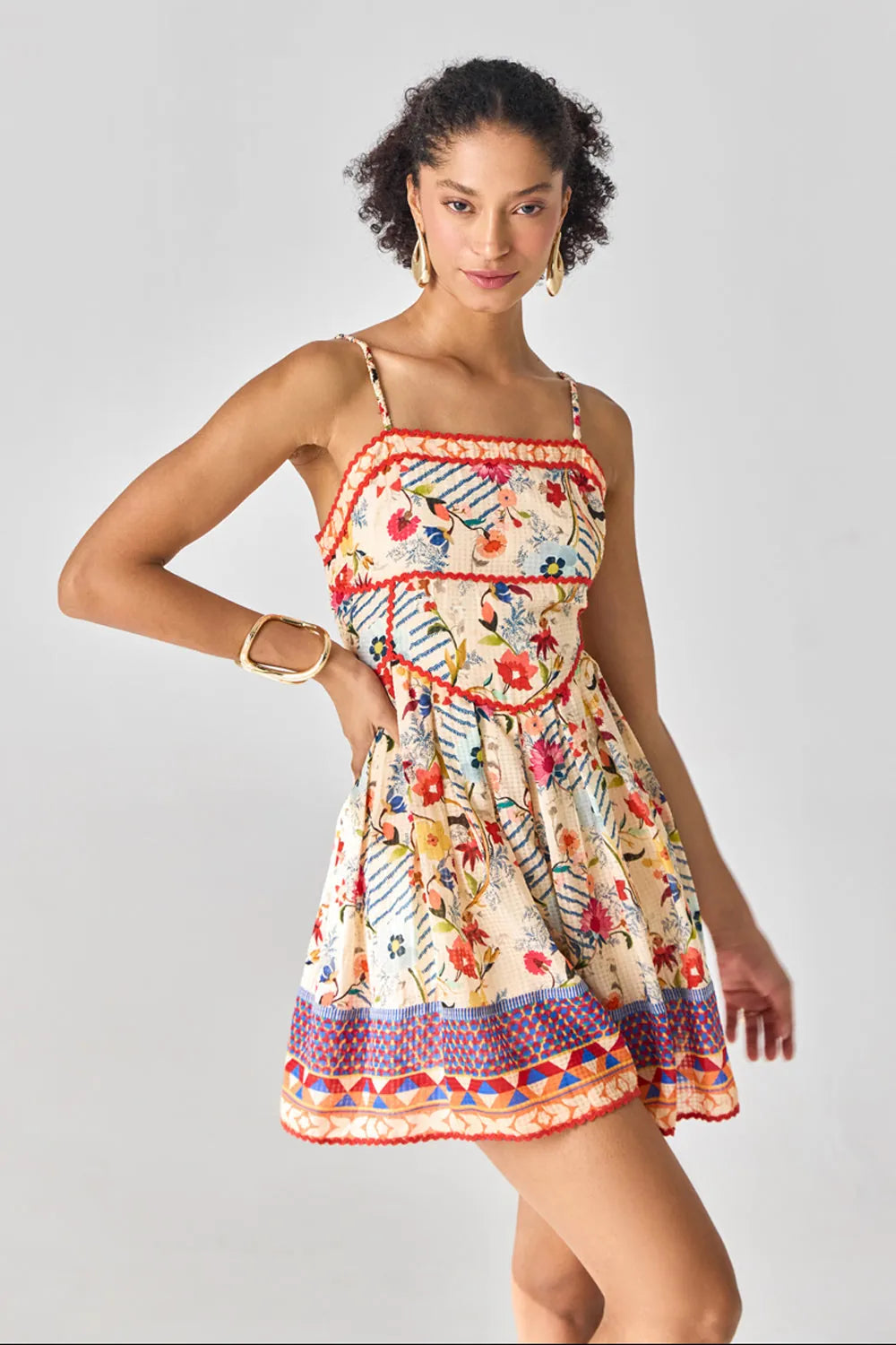 Closeup look of Nora Playsuit women's playsuit featuring a vibrant multicolour printed design, delicate spaghetti straps and a relaxed, flattering silhouette, styled for summer holidays, beach vacations, resort outings and casual daytime gatherings.