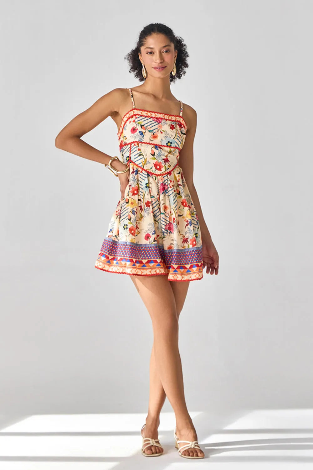 Full view of Nora Playsuit women's playsuit featuring a vibrant multicolour printed design, delicate spaghetti straps and a relaxed, flattering silhouette, styled for summer holidays, beach vacations, resort outings and casual daytime gatherings.