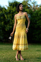 Ocher Dress women's ochre-toned dress featuring a contemporary silhouette and elegant design details, styled for summer brunches, resort vacations, daytime gatherings and special occasions.