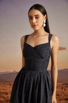 Orsa Dress women's statement dress featuring a contemporary silhouette and distinctive design details, styled for summer brunches, resort vacations, daytime outings and special occasions.