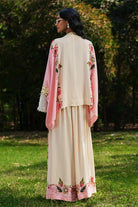 Back view of Percy Embroidered Cape With Pants Set women's coordinated outfit featuring an embroidered cape paired with matching pants, combining decorative detailing with a flowing silhouette, styled for resort vacations, festive gatherings, summer celebrations and elegant evening occasions.