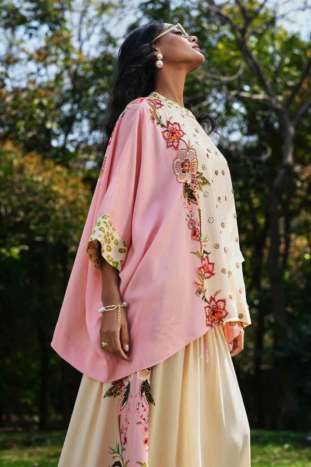 Percy Embroidered Cape With Pants Set women's coordinated outfit featuring an embroidered cape paired with matching pants, combining decorative detailing with a flowing silhouette, styled for resort vacations, festive gatherings, summer celebrations and elegant evening occasions.