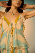 Petro Spaghetti Blouse women's multicolour viscose chiffon blouse featuring delicate adjustable spaghetti straps, a plunging neckline framed with ruffles, a smocked back, a cinched waist and a circular frill hem with beaded tassel accents, styled for resort holidays, beach days, sunset outings and casual evenings.