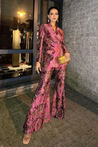 Pragnya Ayyagari wearing the Ramona Jacket & Pants Set, a women's ruby pink velvet co-ord featuring a structured jacket and matching tailored pants with intricate thread and sequin detailing, styled for cocktail parties, festive celebrations, winter events and glamorous evening occasions.