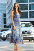 Rakul Preet Singh wearing the Insia Spaghetti Dress, a women's cobalt blue viscose georgette maxi dress featuring a vibrant multicolour print, delicate spaghetti straps and a flowing 54-inch silhouette, styled for summer holidays, beach getaways, resort evenings and destination celebrations.