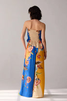 back view of Rey Blouse women's statement blouse featuring a contemporary silhouette and distinctive design details, styled for summer brunches, resort outings, casual celebrations and elevated everyday wear.