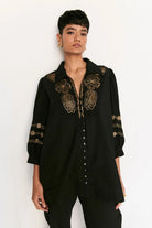 Rimi Co-ord Set women's black cotton outfit featuring a coordinated relaxed shirt and tailored pants, a long shirt silhouette and clean contemporary styling, designed for comfortable travel, elevated daywear, casual gatherings and sophisticated everyday dressing.