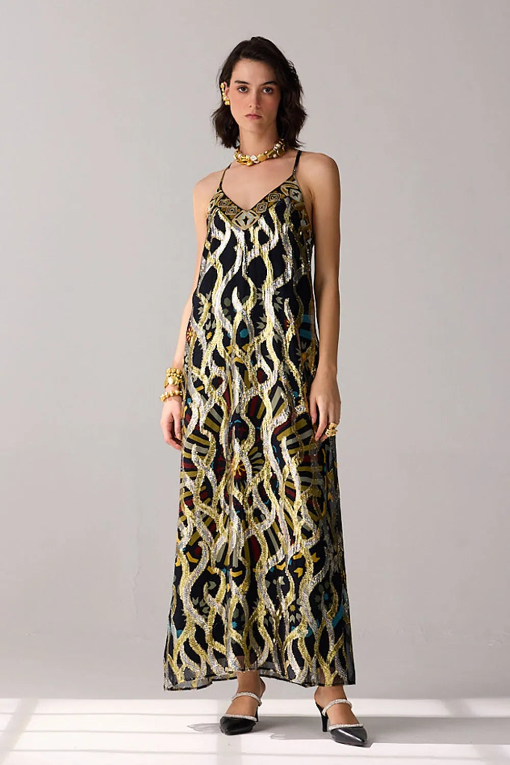 Romi Embroidered Lurex Dress women's statement dress featuring shimmering Lurex fabric, intricate embroidered detailing and an elegant flowing silhouette, styled for festive celebrations, resort evenings, cocktail gatherings and special occasions.