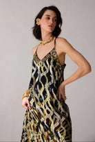 Romi Embroidered Lurex Dress women's statement dress featuring shimmering Lurex fabric, intricate embroidered detailing and an elegant flowing silhouette, styled for festive celebrations, resort evenings, cocktail gatherings and special occasions.