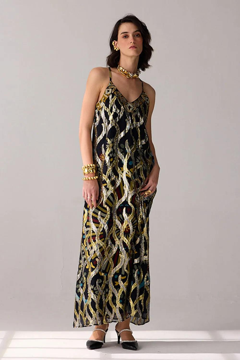 Full view of Romi Embroidered Lurex Dress women's statement dress featuring shimmering Lurex fabric, intricate embroidered detailing and an elegant flowing silhouette, styled for festive celebrations, resort evenings, cocktail gatherings and special occasions.