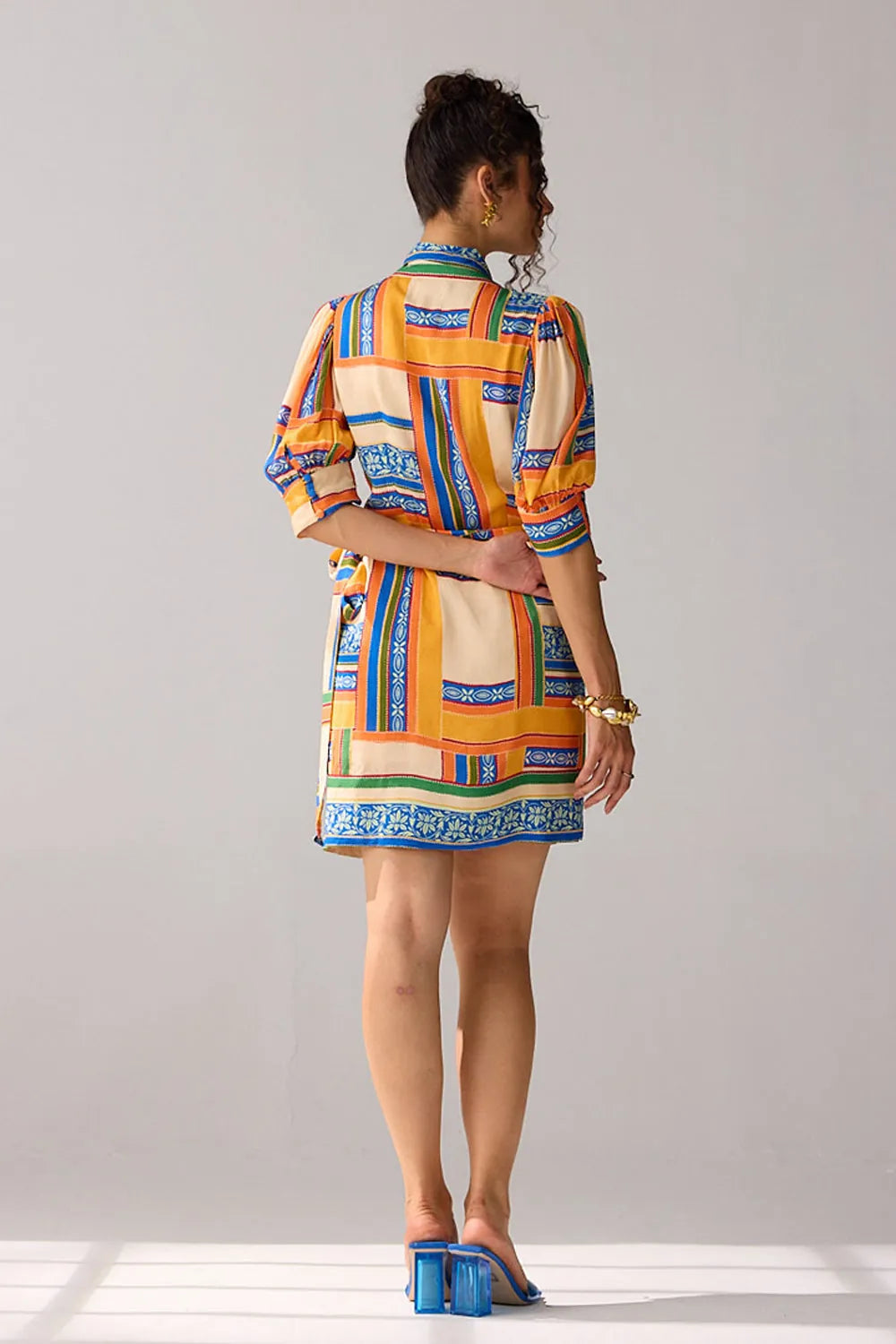 Back view of Rosie Wrap Dress women's wrap-style dress featuring a flattering waist-defining design and feminine silhouette, styled for summer brunches, resort vacations, garden parties and daytime celebrations.