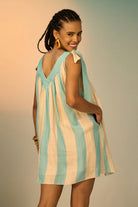back view of Rudy Embroidered Dress women's statement dress featuring decorative embroidery and a contemporary silhouette, styled for summer celebrations, resort outings, festive gatherings and special occasions.