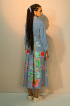 Back view of Rumi Embroidered Midi Dress women's midi dress featuring intricate embroidery, a flattering waistline and a graceful flowing skirt, combining detailed craftsmanship with a feminine silhouette, styled for summer brunches, garden parties, resort vacations and daytime celebrations.