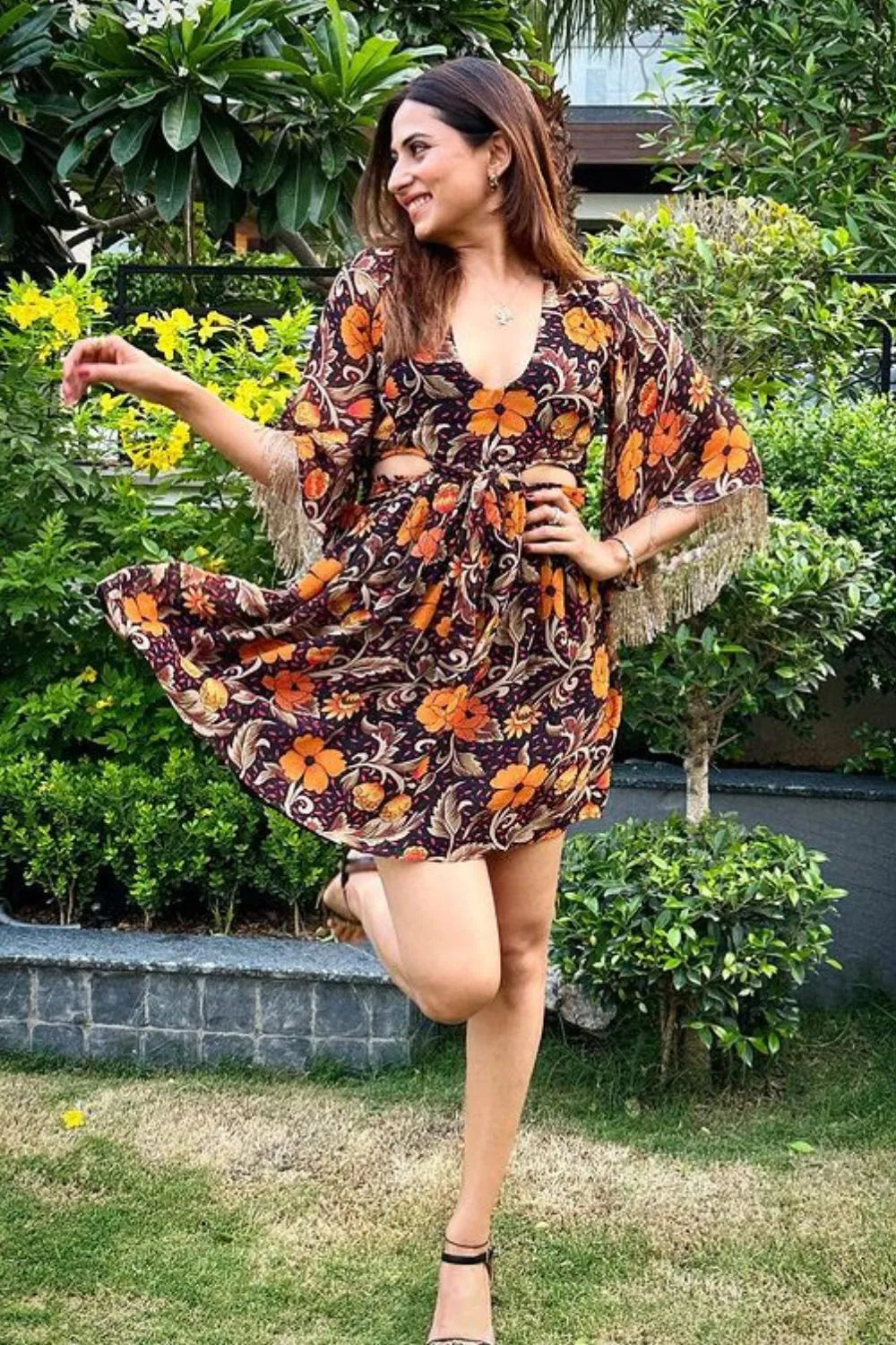 Sargun Mehta wearing the Lina Dress, a women's statement dress featuring a contemporary silhouette and distinctive design details, styled for summer celebrations, resort vacations, brunches and special occasions.