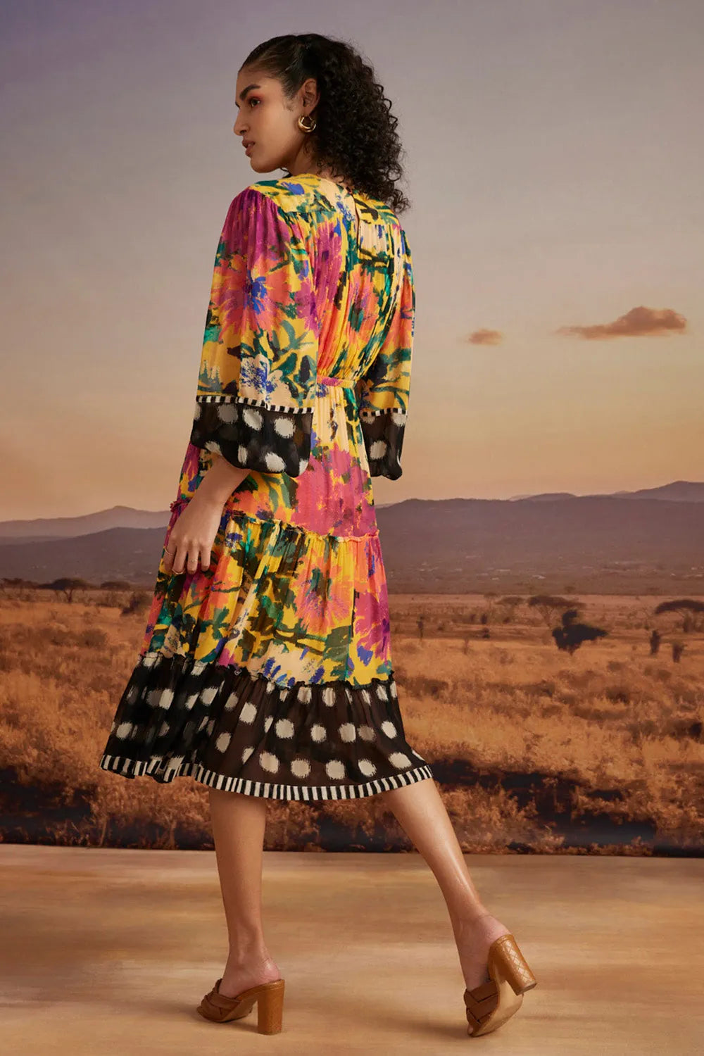 Back view of Sia Midi Dress women's midi dress featuring a feminine silhouette and contemporary design details, styled for summer brunches, resort vacations, daytime outings and special occasions.