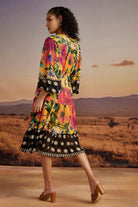 Back view of Sia Midi Dress women's midi dress featuring a feminine silhouette and contemporary design details, styled for summer brunches, resort vacations, daytime outings and special occasions.