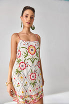 Closeup view of Siena Embroidered Dress women's statement dress featuring intricate embroidery, decorative detailing and a feminine silhouette, styled for summer celebrations, resort outings, festive gatherings and special occasions.