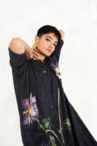 Closeup view of Tushita Dress women's statement dress featuring a feminine silhouette and distinctive contemporary detailing, styled for summer celebrations, resort vacations, brunches and special occasions.