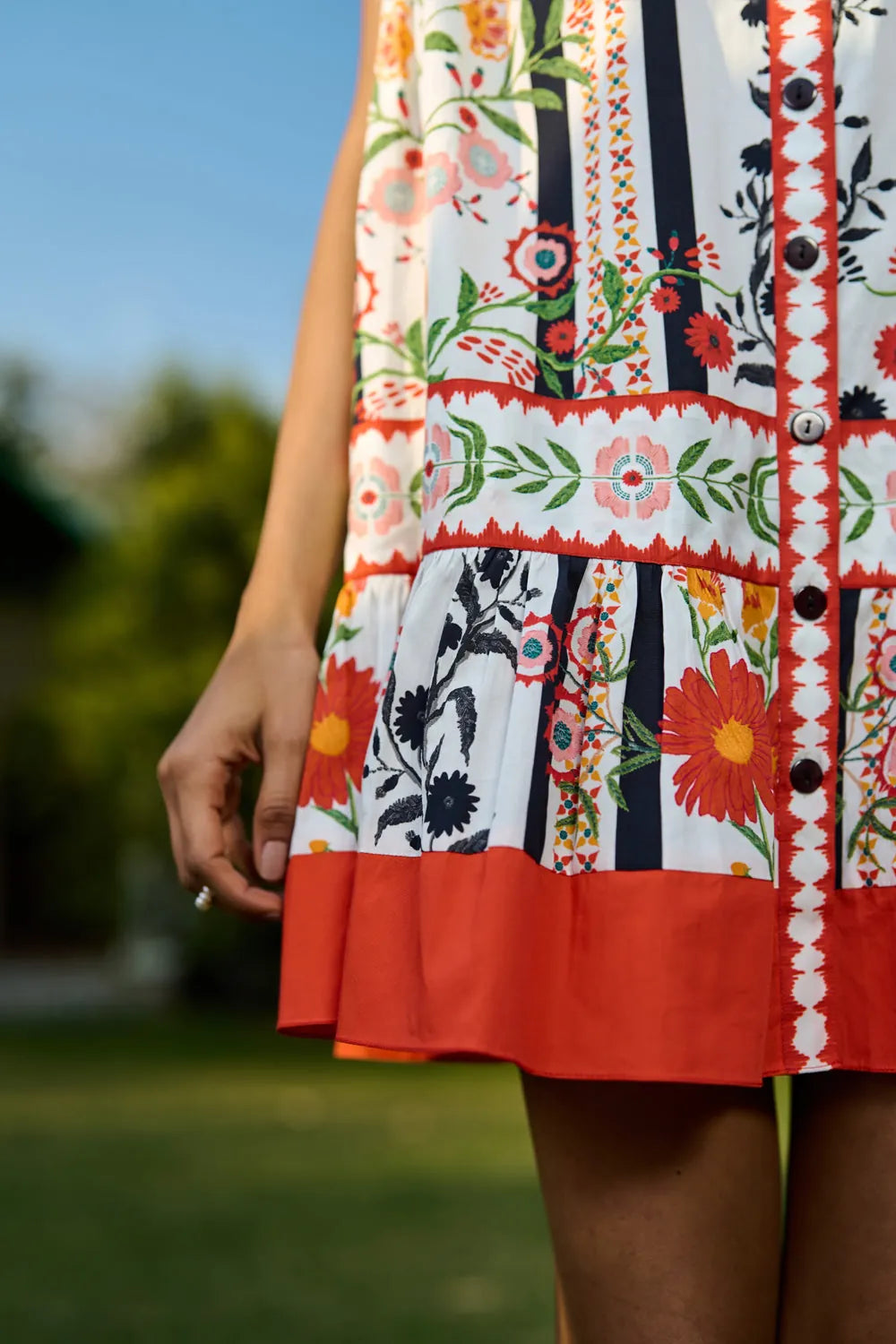 Vriti Dress women's statement dress featuring a feminine silhouette and contemporary design details, styled for summer brunches, resort holidays, daytime celebrations and special occasions.