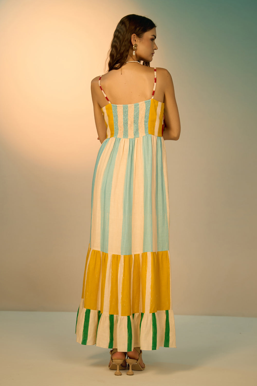 Back view of Aida spaghetti straps dress with bold yellow and cyan with red band cotton-linen perfect for brunch or holidays.