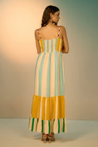 Back view of Aida spaghetti straps dress with bold yellow and cyan with red band cotton-linen perfect for brunch or holidays.